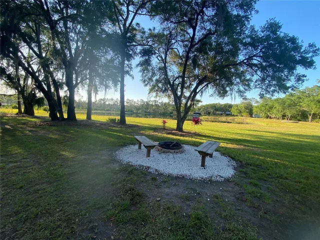 Firepit with lakefront view.