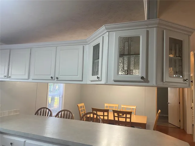 Beautiful glass cabinet doors provide extra eye appeal.