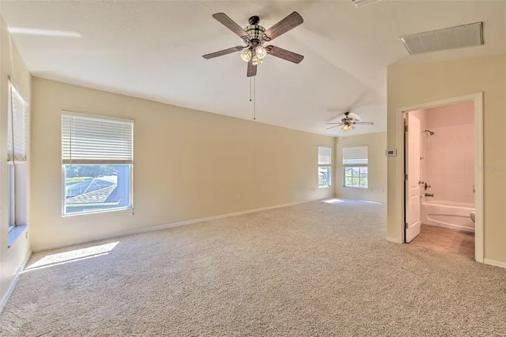 Upstairs Bonus Room with closet and en suite bathroom