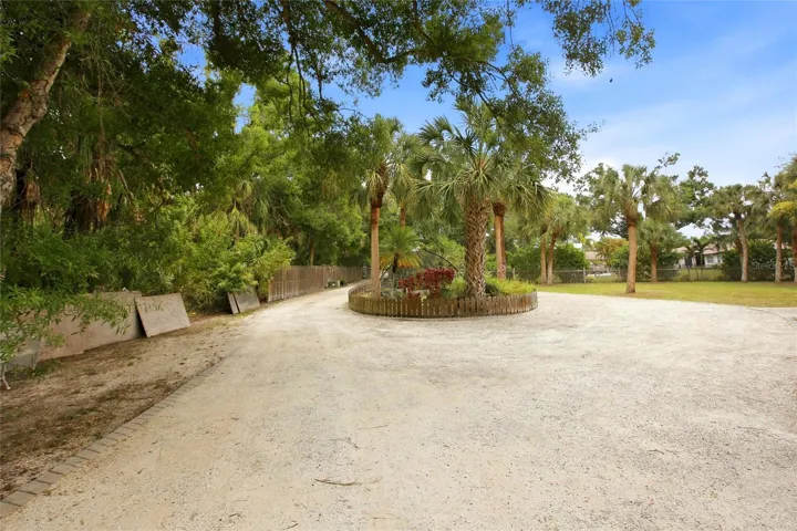 Circular Driveway with center island pond and stream