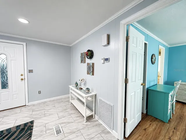 Front Door to the left & Master Suite to the Right