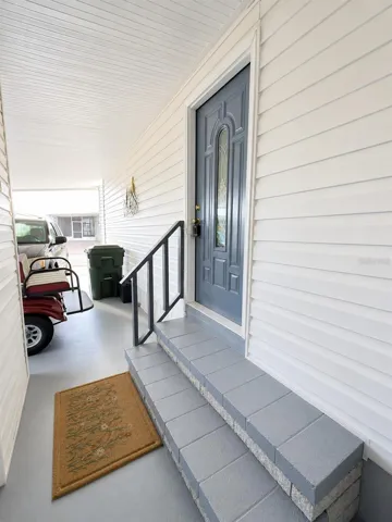 Side Entrance Under Carport