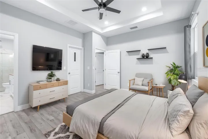 Virtually Staged - Spacious Primary Suite with En-Suite Bathroom and Walk-in Closet