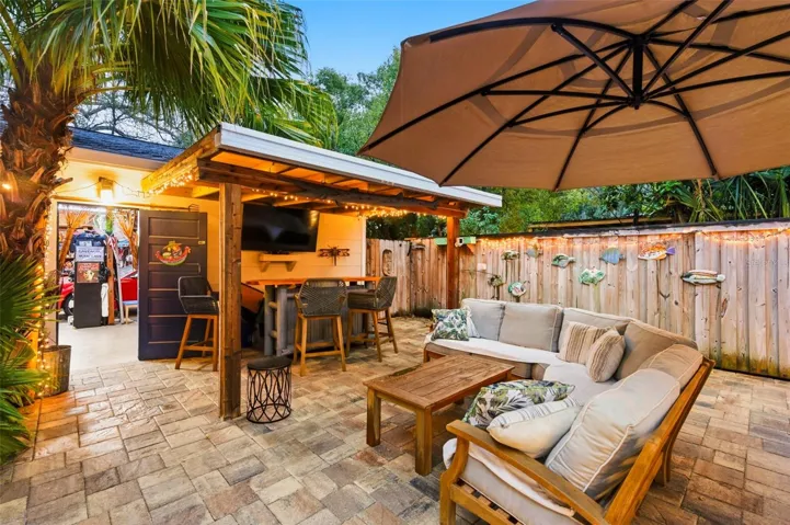 Back Patio with bar and garage access