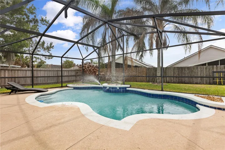 Swimming pool with spa feature