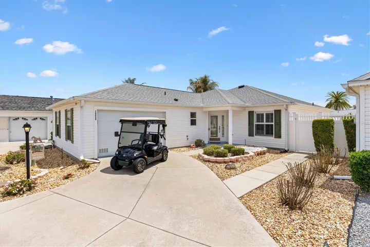 Front drive and entry with golf cart included