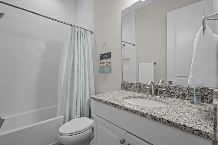 Private en-suite bathroom connected to the guest bedroom.