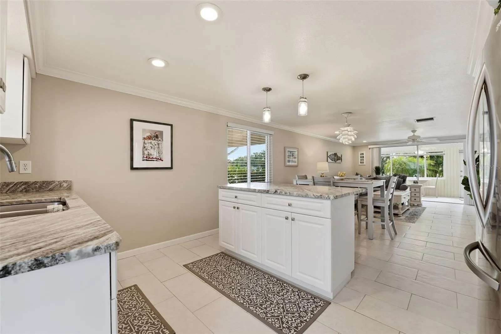 Enter through front door to bright new kitchen.