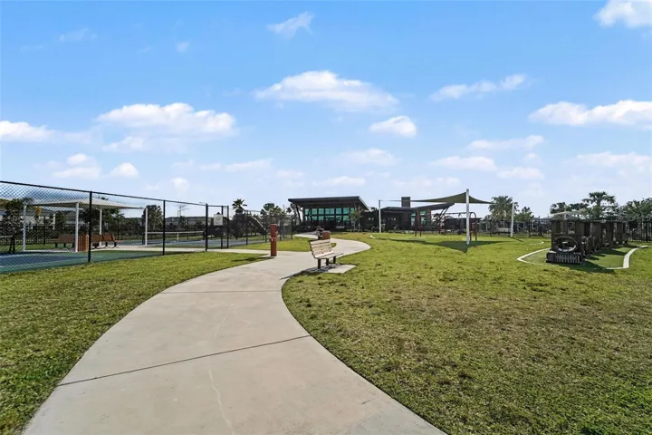 2 Pickleball couts and playground.
