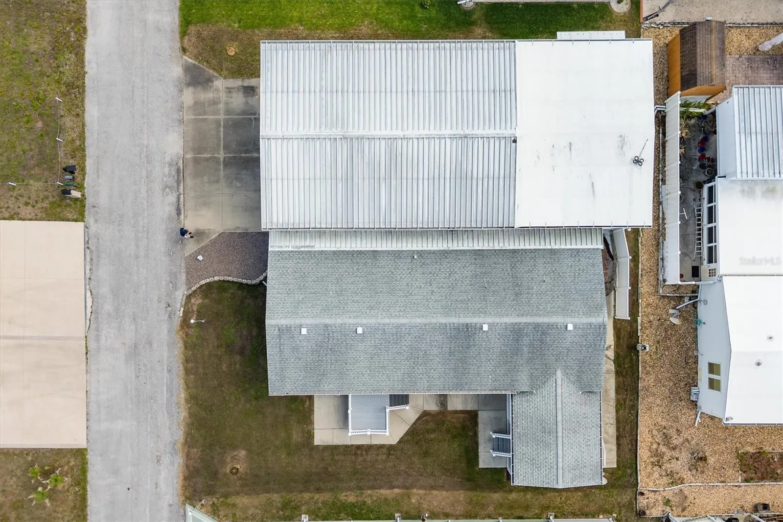 Aerial showing large lot on bottom left.  This used to have an underground wire for dog run .  Was great for their animals.