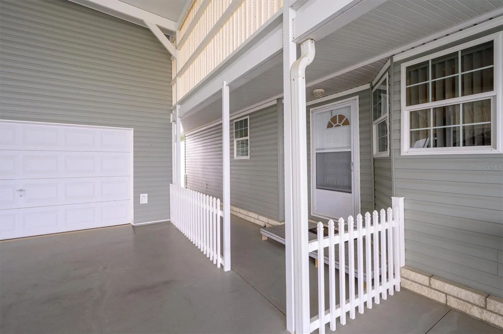 Front entrance showing separate garage entry,  which also can be used as flex room, workout room, etc.