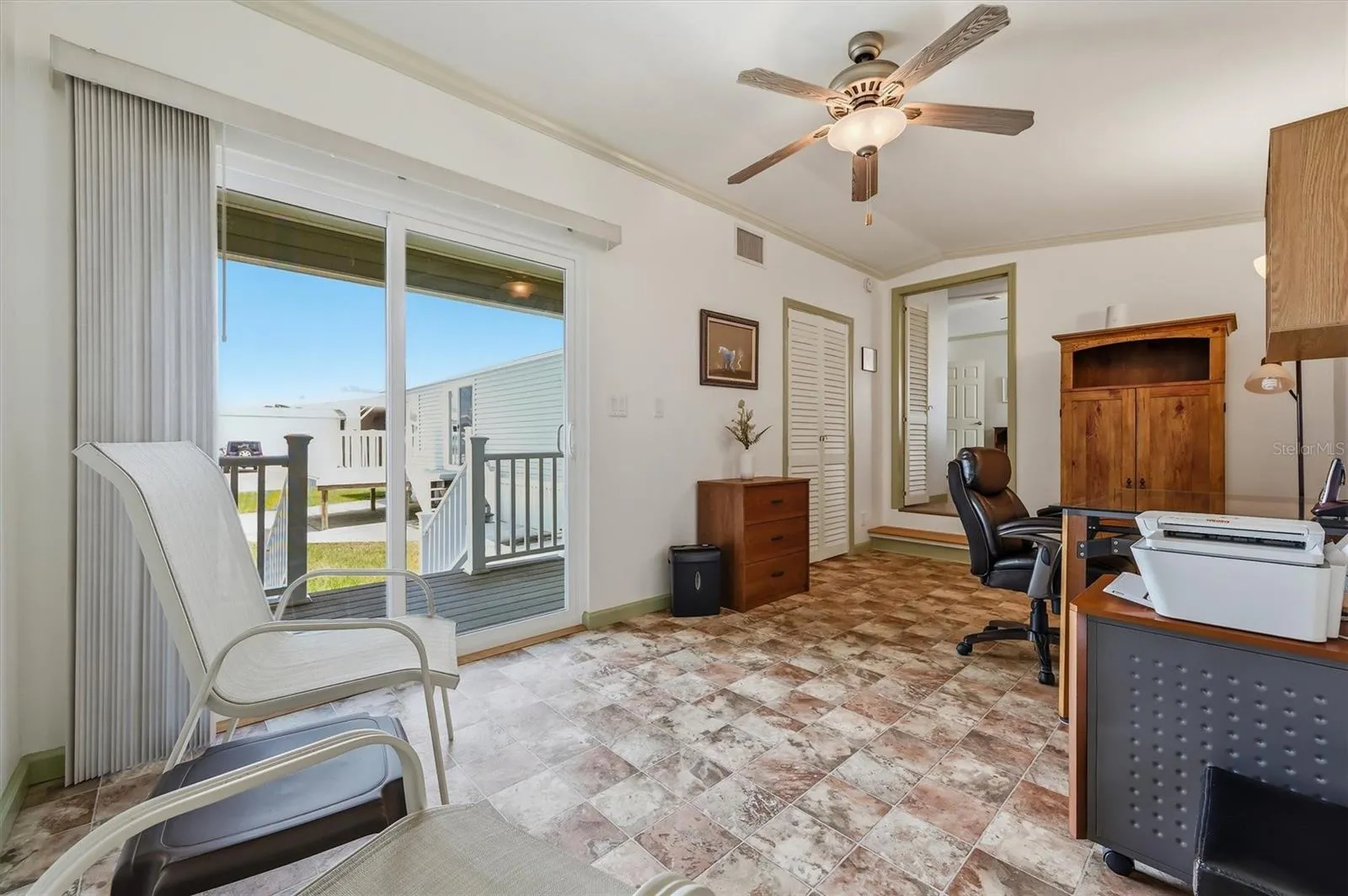 Separate Office or den with picture sliding door and lots of light.  Some office furniture can remain.