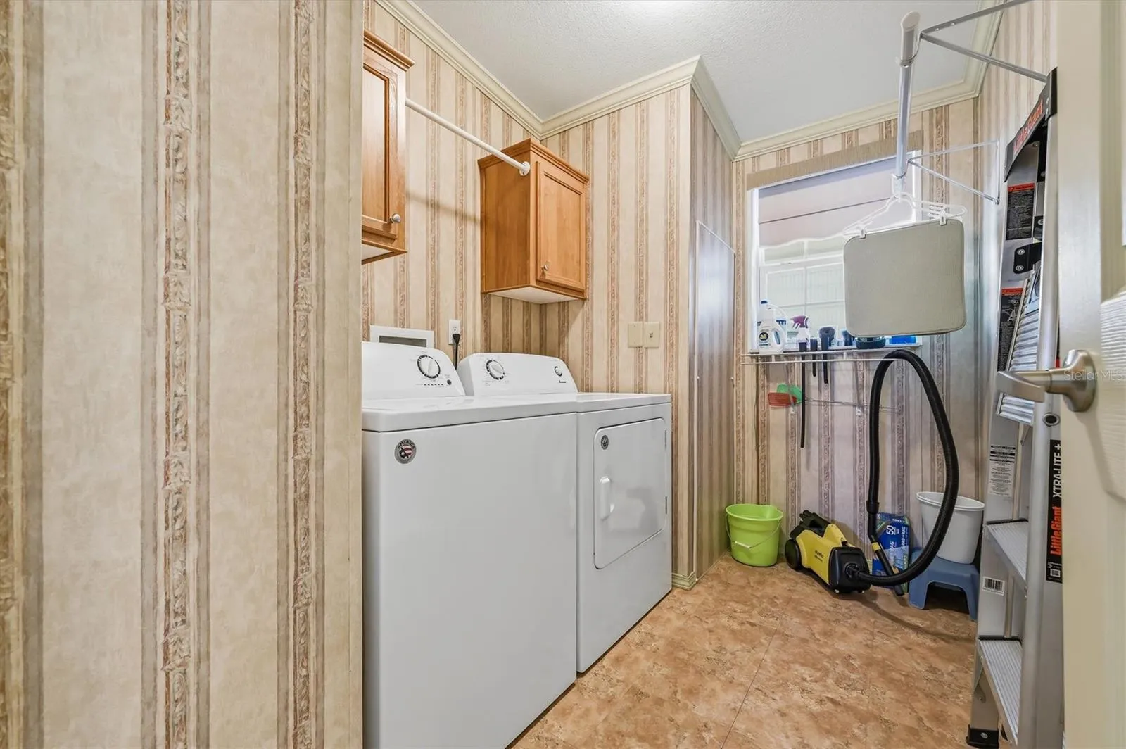 Laundry room in hallway