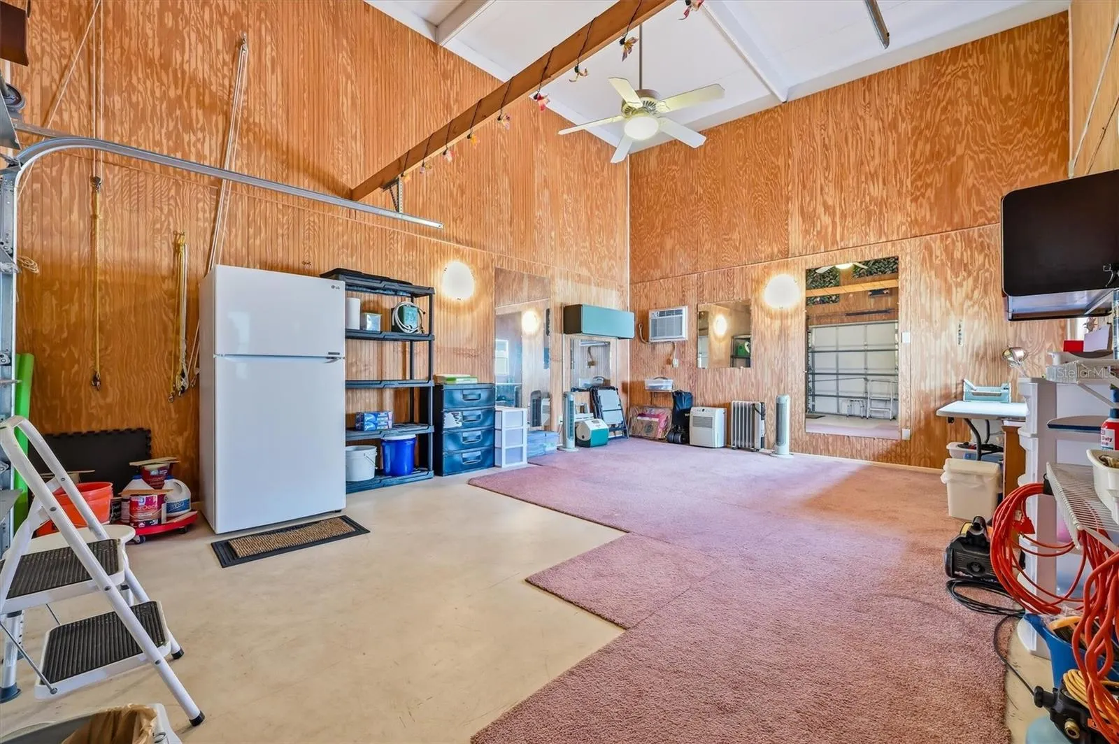 Garage space .  Refrigerator can stay.