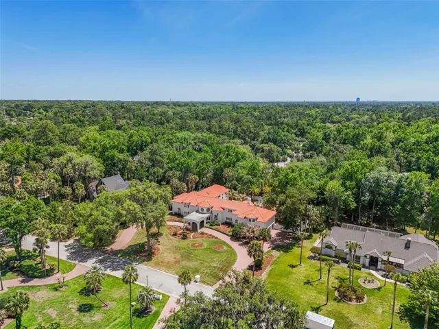 This is a once in a lifetime opportunity to own this Custom, Private Luxury Estate in Longwood’s Wingfield Reserve community, an upscale community of over 180 homes on oversized lots of at least 1 acre located inside the Prestigious Markham Woods Corridor!