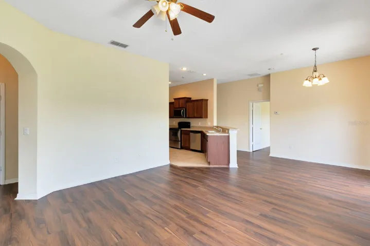 Step inside to discover an open-concept design filled with NATURAL LIGHT, enhanced by WOOD-LOOK TILE FLOORING throughout the main living areas.