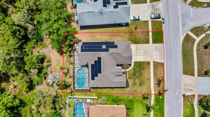 approx. property line & See Solar Panels on S side of roof- Owner owns!