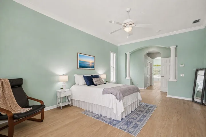 Primary bedroom with two walk in closets
