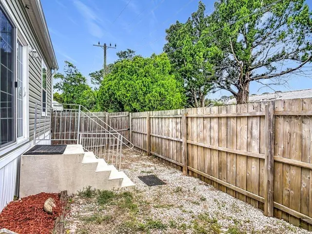 Fenced side for pets