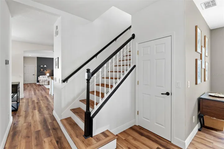 Upstairs, a SPACIOUS LOFT provides a versatile gathering space, perfect for a media room, game room, or additional lounge.