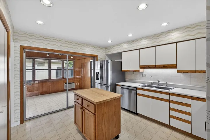 Kitchen with ample cabinetry, center island.