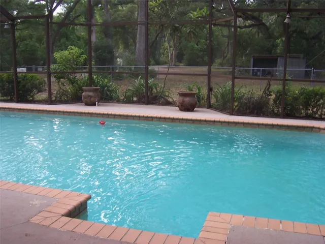 3 to 6 foot deep pool completely caged and so inviting for those fun pool days or relaxing summer evenings.
