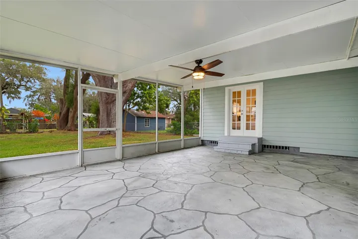The screen enclosed patio is accessible from the Florida Room and the primary bedroom.