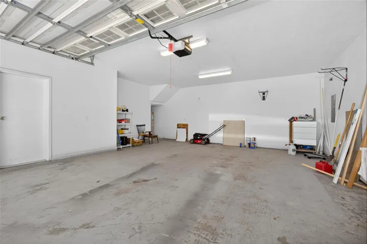 Huge 2 Car Garage with Storage Area Rear Home