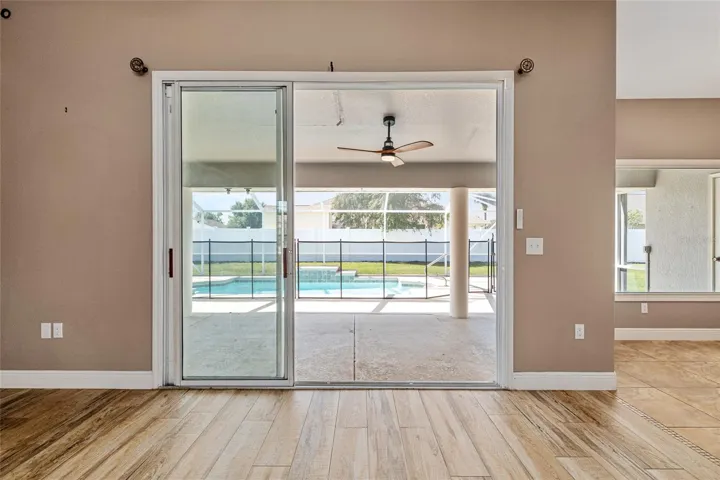 GREAT ROOM SLIDING DOORS LEADING TO LANAI
