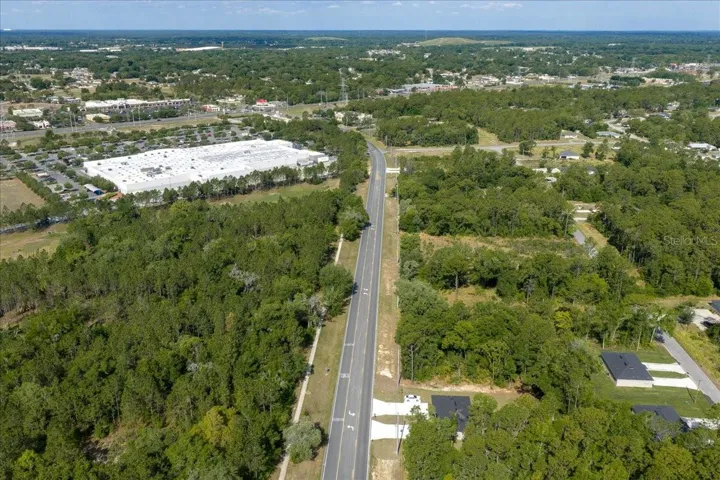 View of subject property and surrounding area facing west