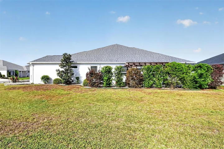 Side Elevation with Privacy Landscaping and ROOM FOR A POOL!