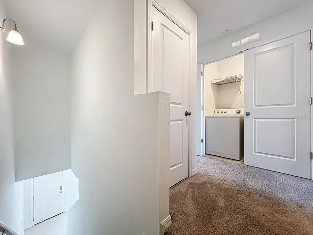 Top of Stairs - 2 (view to laundry closet)
