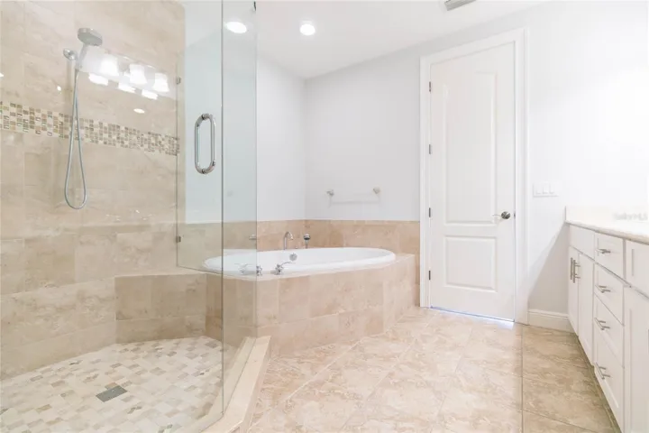 Frameless glass shower, soaker tub - it's all there