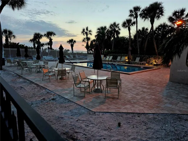 SUNSET AT THE BEACHFRONT POOL