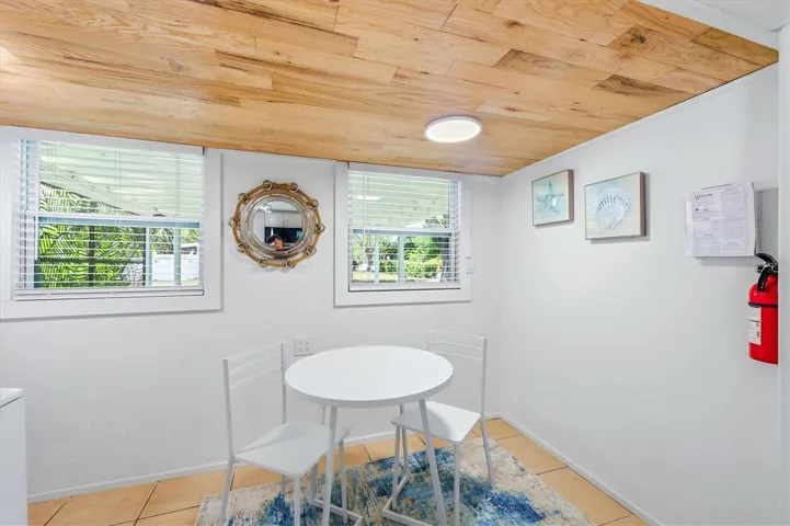 1/1 eat in dining and beautiful shiplap ceiling