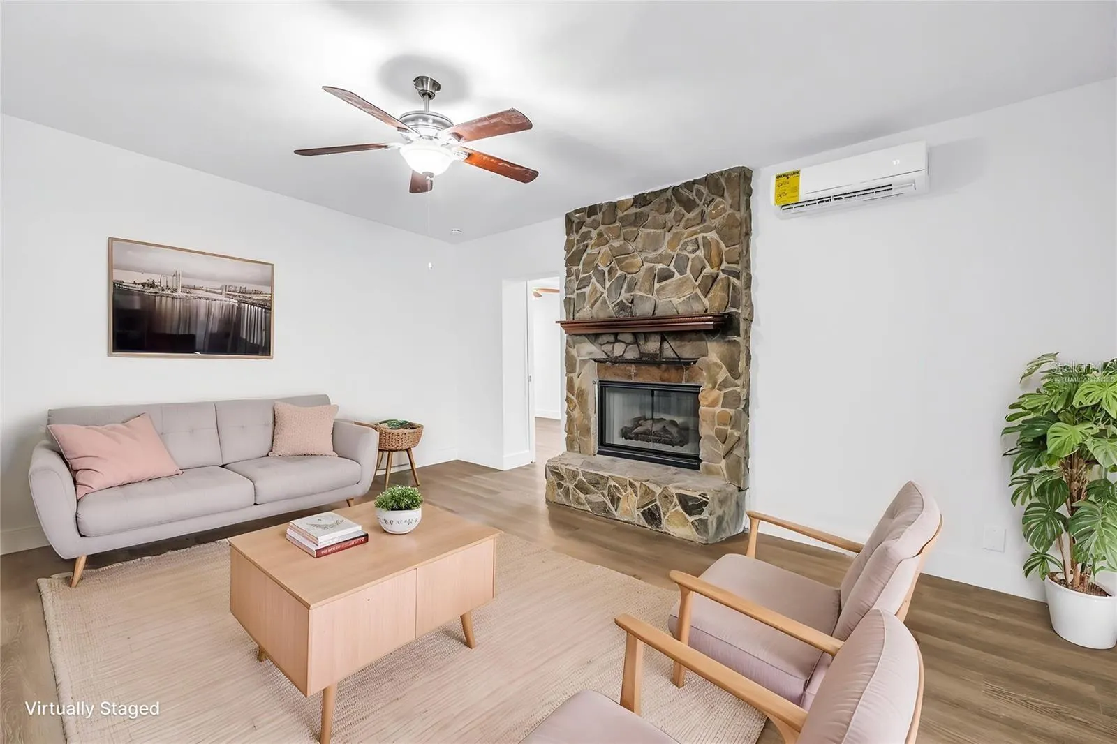 Virtually staged main house living room.