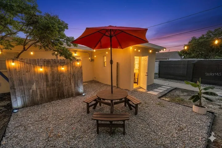 Courtyard lite up at night.