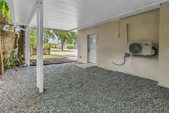 Main house patio. Could be converted back into a carport.