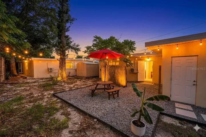 Courtyard lite up at night.