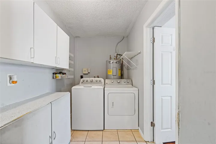 Laundry room with storage, in between bedroom 3 & 4