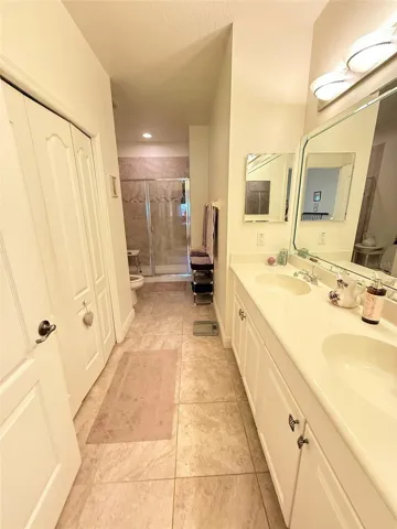 Ensuite Bathroom: Double Vanity With Double Sinks And Closet