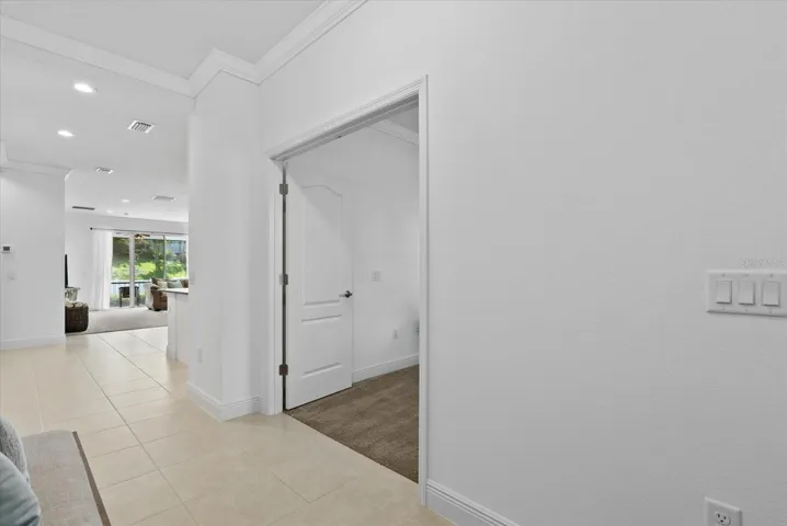 Foyer/hallway creates spaces from main living area