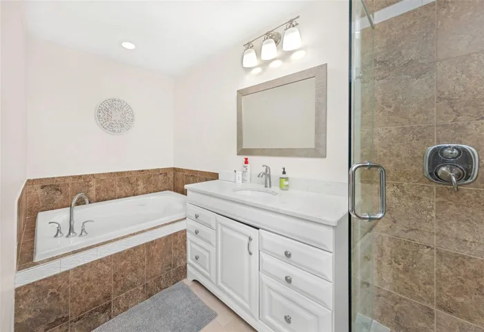 Master bath with a tub