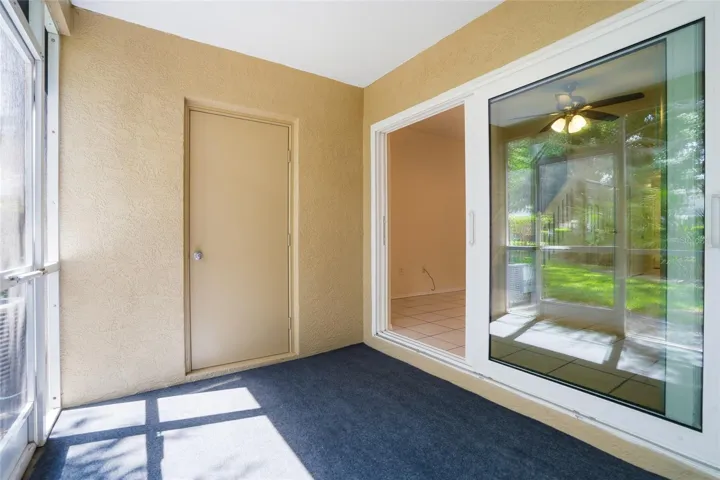 screened in lanai with storage room