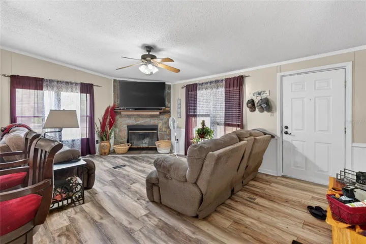 Wood burning fireplace with door leading to the rear porch!