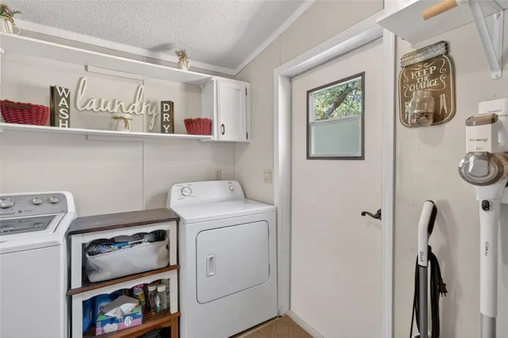 Laundry room with side access door