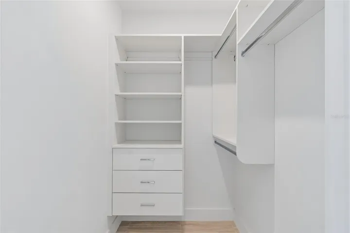 Secondary walk-in built-in closet