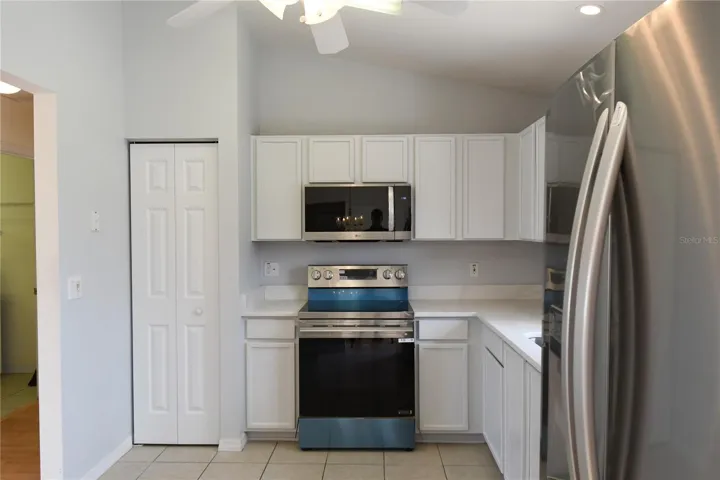 Updated Kitchen With View of the Pantry