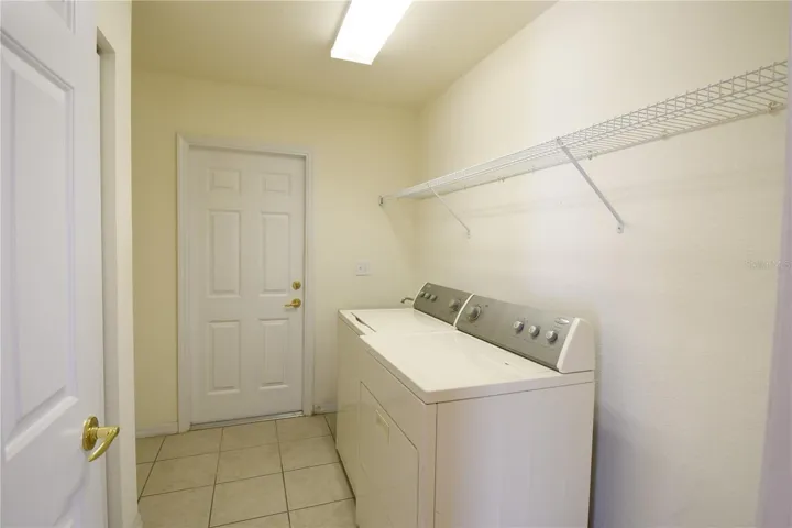 Laundry Room with Tile Flooring