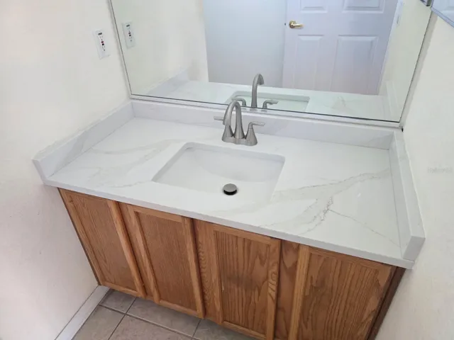 Master Bathroom has been Updated with New Faucets & Quartz Countertops